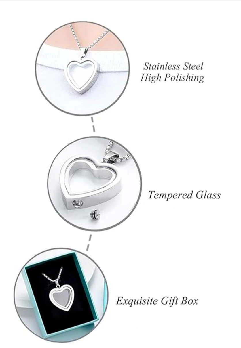 Heart-shaped stainless steel cremation pendant on a chain, polished finish, shown in an elegant gift box.