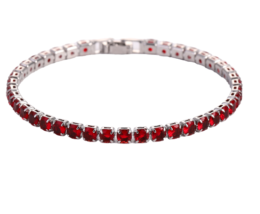 Red zircon tennis bracelet set with a shiny silver-tone metal clasp and a row of sparkling red stones.
