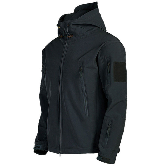 Men's tactical jacket in black, featuring a waterproof soft shell, adjustable hood, and multiple zippered pockets.