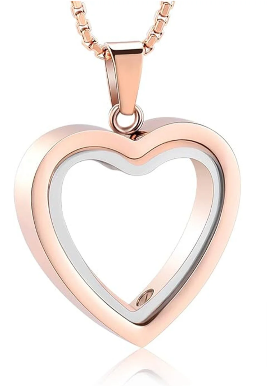 Heart-shaped stainless steel pendant in rose gold with a thin profile, showcasing a two-tone design.