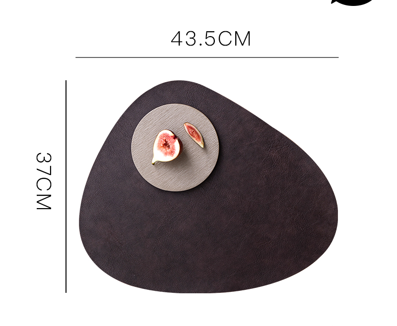 Dark brown waterproof leather placemat with a smooth texture, featuring a circular plate with sliced fruit.