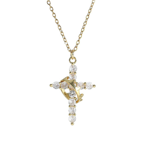Y-shaped gold necklace featuring a crown and cross pendant adorned with clear crystals, symbolizing strength and faith.