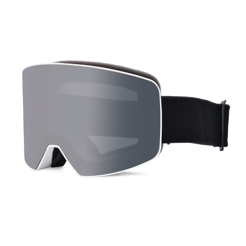 Ski goggles with a grey tinted lens, featuring a black adjustable strap and a sleek white frame.