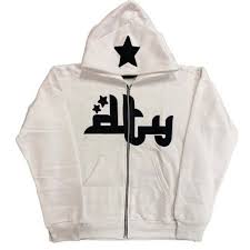 White zip-up hoodie featuring a black star print and playful graphics on the front. Relaxed fit for comfort.