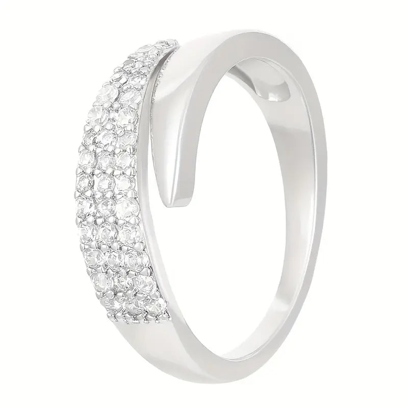Elegant Adjustable Sparkle Ring featuring a sleek silver band and rows of sparkling stones for a modern, luxurious look.