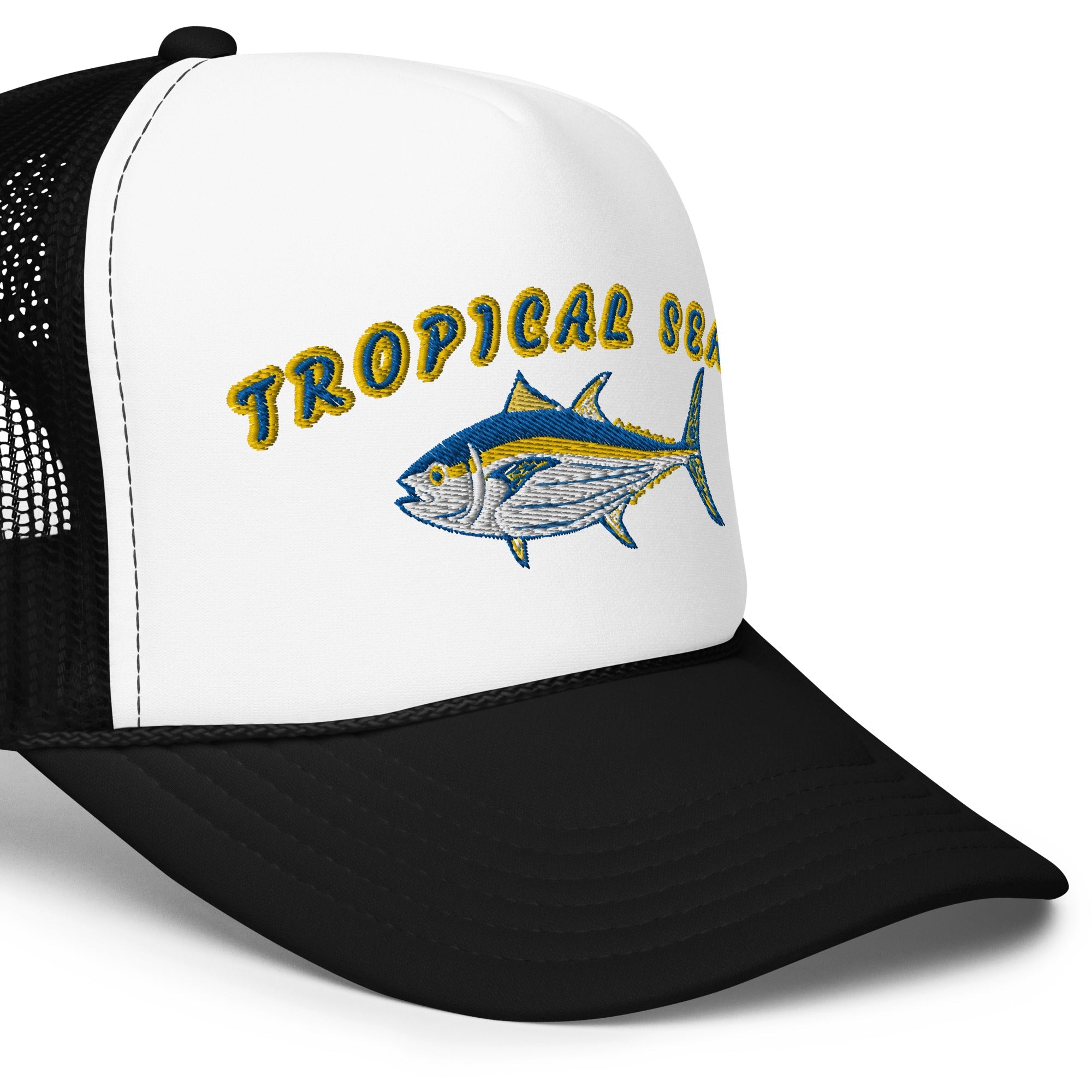 White foam trucker hat featuring an embroidered blue tuna design and yellow "Tropical Seas" text with a black mesh back.