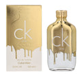 CK One Gold Eau de Toilette features a sleek bottle with a metallic gold cap, surrounded by a gold and white box.