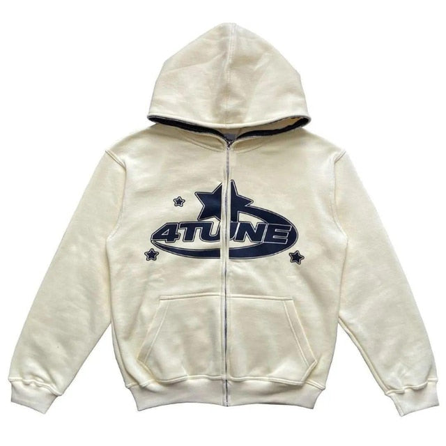 Cream zip-up hoodie with navy star print and logo, featuring a relaxed fit and front pockets.