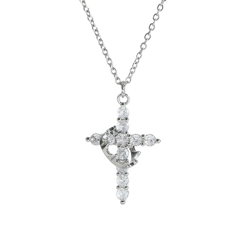 Delicate Y-shaped silver necklace featuring a crown and cross pendant, adorned with clear stones for added elegance.