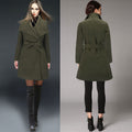 Olive green woolen coat with a lapel collar, long sleeves, and a tied waist, styled over black leggings and knee-high boots.