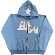 Light blue zip-up hoodie featuring a playful star print and a relaxed fit for comfort. Soft fabric with a hood and front pockets.